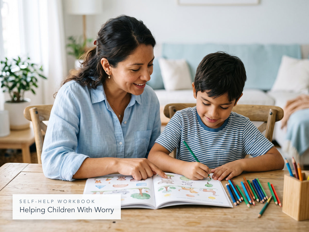 Mother and son working together in the Helping Children With Worry workbook